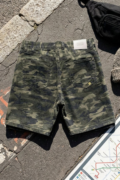 BLAKE OVERSIZED DENIM SHORTS Splatter Camo women's knolling flat lay